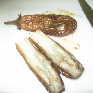 a very soft roasted eggplant and one cut in half