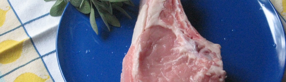 veal rib chop with whole fresh sage leaves