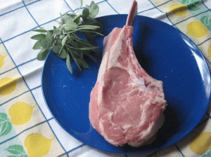veal rib chop with whole fresh sage leaves