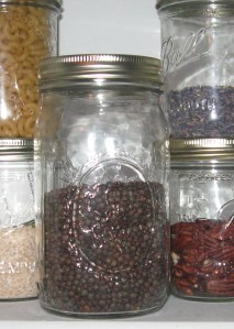 lentils in Mason/Ball jar on pantry shelf.