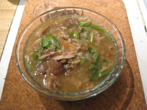 bowl of soup with greens