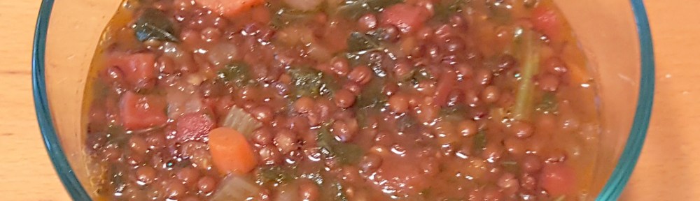 clear glass bowl with lentil soup