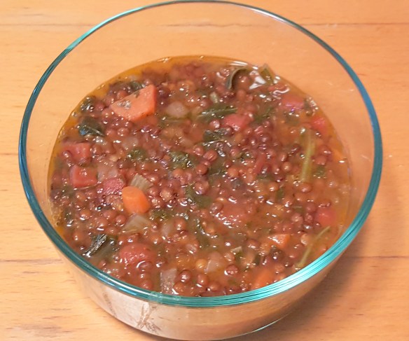 clear glass bowl with lentil soup